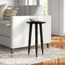 Ozzy black dark espresso mango wood end table with bobbin turned legs styled next to a couchWhy