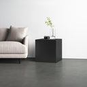 Dante modern black finish minimalist metal cube end table styled in a room