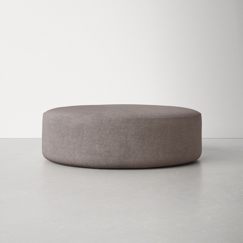 Grady Polyester Round Cocktail Ottoman Furniture BoutiQ