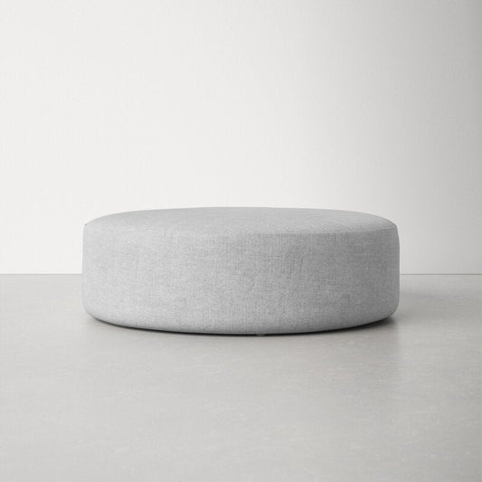 Grady Polyester Round Cocktail Ottoman Furniture BoutiQ