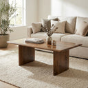 Scott rectangular wood coffee table styled in a transitional living room with an oatmeal sofa