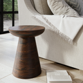 Marcellus round dark brown solid wood end table with ribbed pedestal base styled in a room