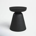 Matte black concrete drum end table with tapered pedestal base three-quarter studio view