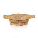 Harry square solid wood coffee table three-quarter studio view showcasing ribbed pedestal base