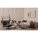 Remi nesting coffee table set styled in a large modern living room with a sectional sofa and accent chair