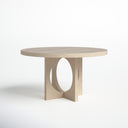 Loyal Round 6 Seater Dining Table in natural wood finish shown against a clean white background, featuring a round tabletop and circular cutout pedestal base.