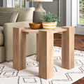 Junior square light oak solid wood end table with thick block legs styled in a room