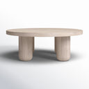 Vicente round light oak coffee table straight front view showing thick cylindrical legs