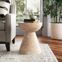 Joziah natural white washed solid wood hourglass sculptural end table styled in a room
