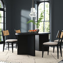 Detailed close-up of the black Byron dining table tabletop showing its dark wood grain and rounded edge profile.
