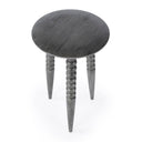 Top down angle view of Ozzy round end table showing distressed grey wood grain surface