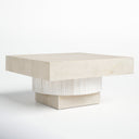 Ben square cream coffee table low three-quarter angle view showcasing fluted block pedestal base