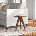 Titan round solid wood 3 legs end table with arched tripod base styled in a room