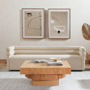 Harry square solid wood coffee table with ribbed pedestal column base in a bright living room