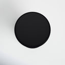 Top down view of Clyde round end table showing flat black matte surface layout
