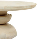 Close up cropped view of Musa coffee table tapered tabletop edge and stacked circular pedestal base
