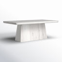 Langston Dining Table in whitewashed wood finish shown against a white background, featuring a thick rectangular tabletop and tapered pedestal base.