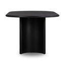 Close-up of the black Kiaan dining table showing the smooth tabletop surface and rounded edge detail.