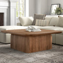 Brendan square solid wood block coffee table with rounded edges in a bright living room