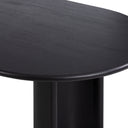 Detailed close-up of the black Kiaan Oval 6 Seater Dining Table highlighting the curved tabletop corner and dark wood finish.