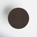 Top view of the Mylo Round Dining Table displaying its circular dark wood tabletop and subtle vertical grain lines.