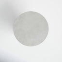 Top down view of Trace round side table showing white marble top texture