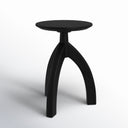 Cillian round black solid wood end table alternative three-quarter studio view