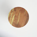 Top down view of Salvador round end table showing multi-toned mango wood grain layout