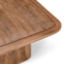 Close up angle view of Brendan coffee table showing smooth rounded corner frame and wood grain