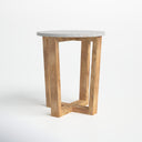 Forest round marble top end table three-quarter studio view showcasing geometric wooden X-base legs
