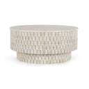 Khari round white coffee table straight-on side view showing stacked cylindrical wood block texture
