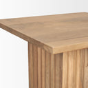 Close up angle view of Aron end table corner showing flat wood top and fluted base joinery