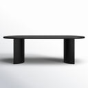 Front view of the black Kiaan Oval 6 Seater Dining Table highlighting its elongated oval tabletop and simple cylindrical pedestal legs.