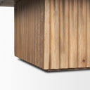 Close up textured detail of the vertical fluted lines on Davian coffee table wooden pedestal base
