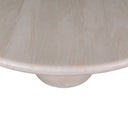 Close-up of the Tomas Round 6 Seater Dining Table’s smooth light wood tabletop and rounded pedestal detail, highlighting its natural grain and soft curves.