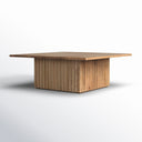 Davian square wood coffee table side profile view showcasing fluted base design