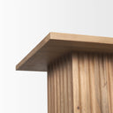 Close up low angle view of Aron end table showing square tabletop overhang and fluted pedestal base