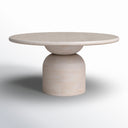 Tomas Round 6 Seater Dining Table shown on a white background, featuring a round tabletop and rounded two-tier pedestal base in a light wood finish.