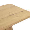 Detailed close-up of the Langston Dining Table showing the natural wood grain and subtle character marks across the tabletop