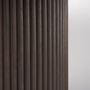 Detailed view of the Mylo Dining Table pedestal and tabletop junction, showcasing the curved construction and rich dark wood finish.