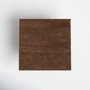 Top down view of Lachlan square coffee table showing dark wood grain tabletop finish