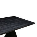 Skyler black 8 seater dining table styled with eight upholstered dining chairs in a bright contemporary dining room.
