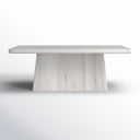 Front view of the whitewashed Langston Dining Table showing its wide rectangular tabletop and tapered central pedestal.