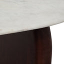 Close up texture detail of Ricky coffee table stone composite tabletop surface and dark wooden leg