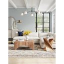 Legacy solid wood geometric abstract end table styled in a modern luxury living room