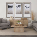 Lachlan square coffee table styled in a complete living room scene with matching cane sideboard and abstract wall art triptych