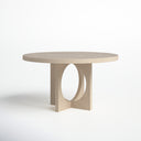Angled view of the Loyal Round 6 Seater Dining Table showcasing its natural wood grain, rounded tabletop, and overlapping circular pedestal design.