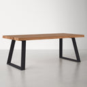 Emir Solid 6 Seater Dining Table shown from an angled view, featuring a thick natural wood tabletop and four sturdy black metal legs.