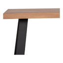 Detailed side view of the Emir Solid Dining Table highlighting the substantial wood tabletop edge and angled black metal support leg.