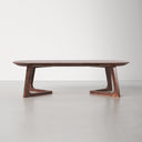 Donald oval walnut wood coffee table straight side profile view showing cantilever bracket legs